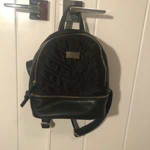 G by Guess small black and gold backpack